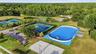 Tennis court, sand volleyball court, roller hockey rink and soccer field