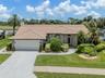 Beautifully positioned on larger lot with both water and golf course views