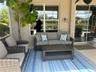 SEATING AREA UNDER COVER ON POOL AREA