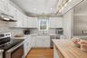 White cabinetry with brushed nickel hardware