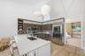 Modern kitchen with stainless appliances in Palm Beach Polo seasonal rental