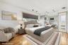 Bedroom featuring light wood-type flooring and radiator