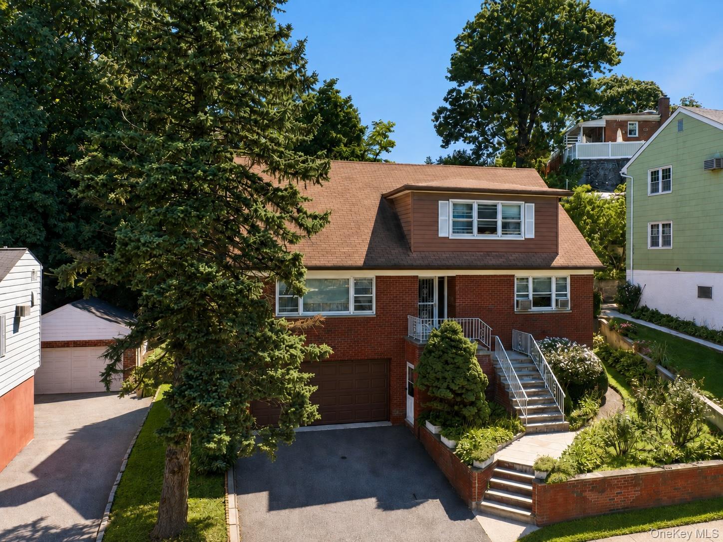 Welcome home to this charming cape cod in historical Park Hill.