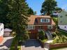 Welcome home to this charming cape cod in historical Park Hill.