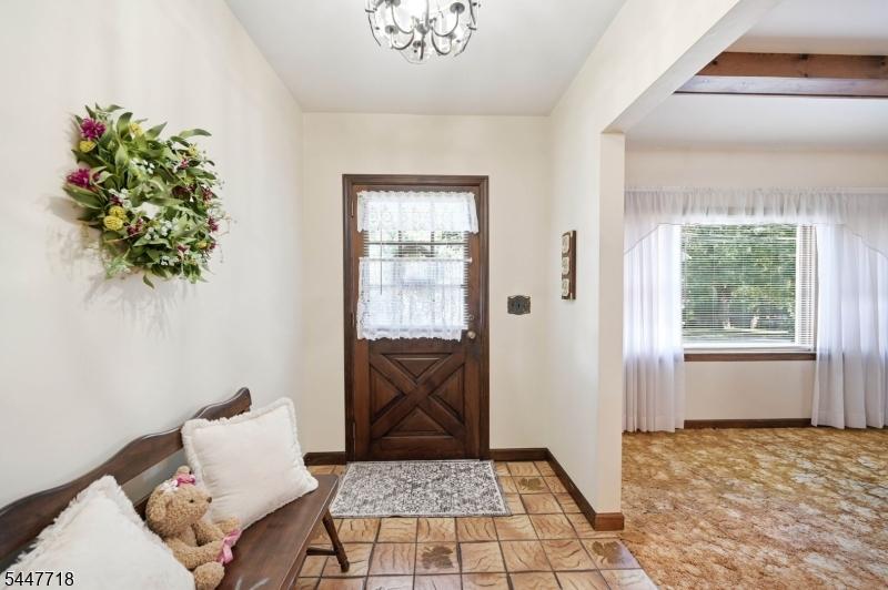 Foyer, partial living room