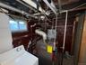 Basement utility area featuring a boiler system