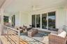 Balcony off living room and primary bedroom