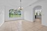 FORMAL DINING ROOM WITH A LAKE VIEW
