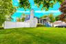 From the front of the house and lawn, side of house to the end of the property
