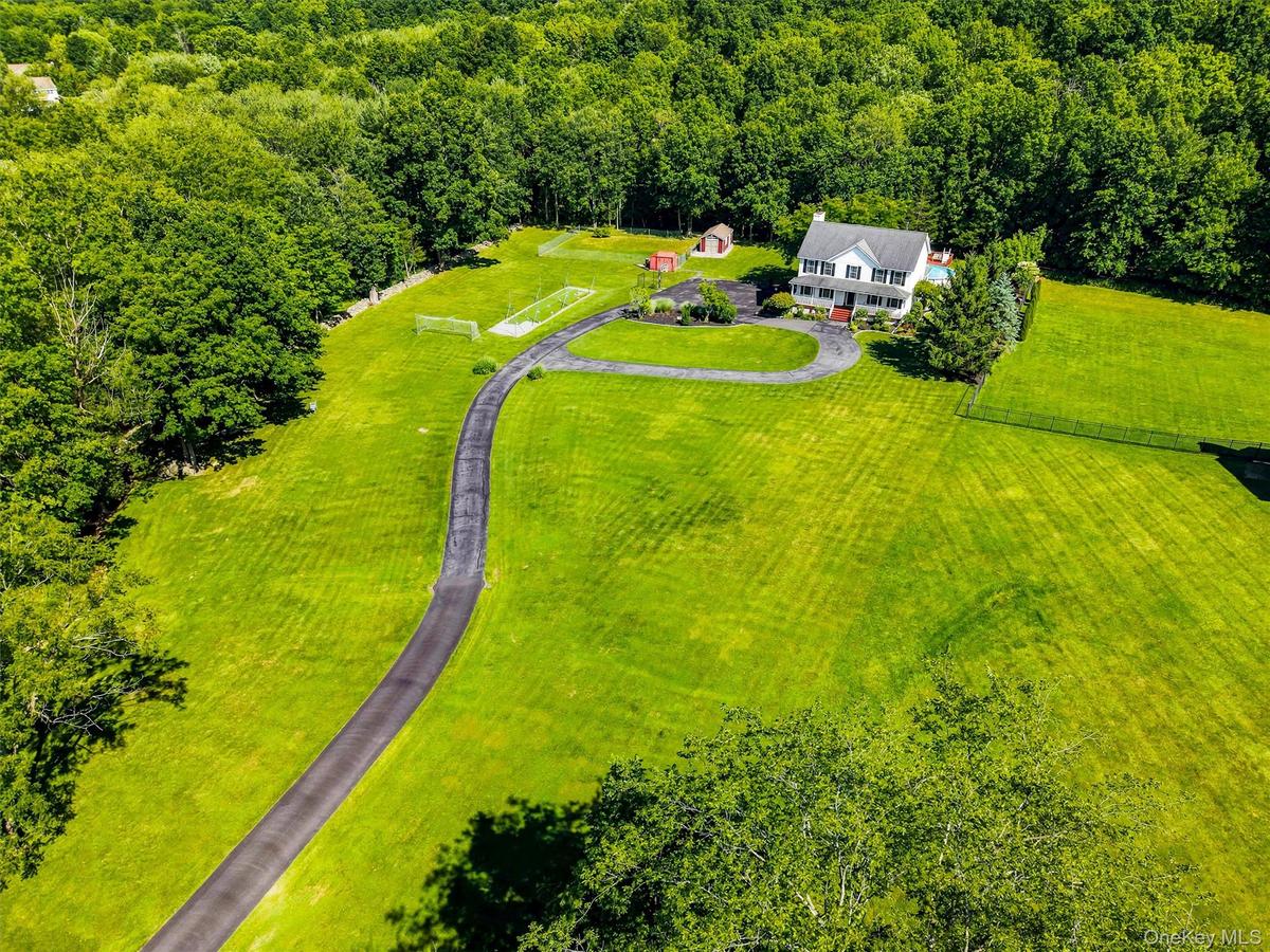 Sky view of property, front.