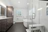 Generous double vanity with Smart mirrors