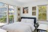Bedroom featuring multiple windows