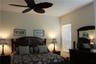 Turns down the lights and this Master bedroom is as romantic as it is functional......