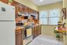 All wood cabinets in beautiful (like-new!) condition.