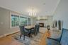 Dining room with fireplace and water view