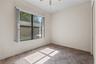 Bedroom 4 in rear of home with conservation views