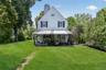 Side of home with covered patio