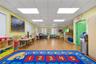 Game room featuring wood finished floors and a paneled ceiling