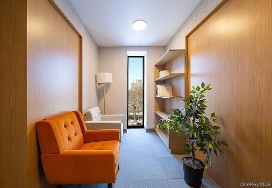 Modern interior featuring wood-panel accent walls and recessed shelving