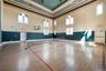 View of basketball court with tennis court