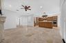 Kitchen flows seamlessly into the family room