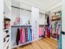 1 of 2 walk in closets in the primary suite