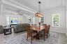 Spacious dining room can accommodate any combination of dining room furniture.
