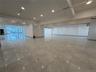 Unfurnished room with baseboards and recessed lighting