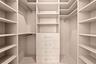 First-Floor Guest Bedroom – Spacious Walk-In Closet