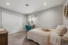 The third guest bedroom is of ample size with double door deep closets.