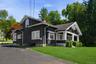 Timeless Craftsman architecture with undeniable curb appeal from every angle.