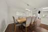 Dining Area accented by columns w/seating for 8