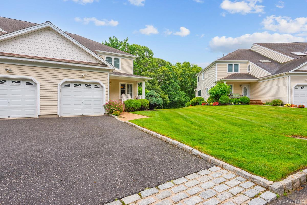Belgium Block Lined Asphalt Driveway with Belgium Block Apron