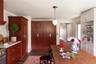 Dining area featuring dark wood-style floors