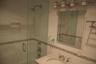 Full bathroom with vanity and tiled shower / bath