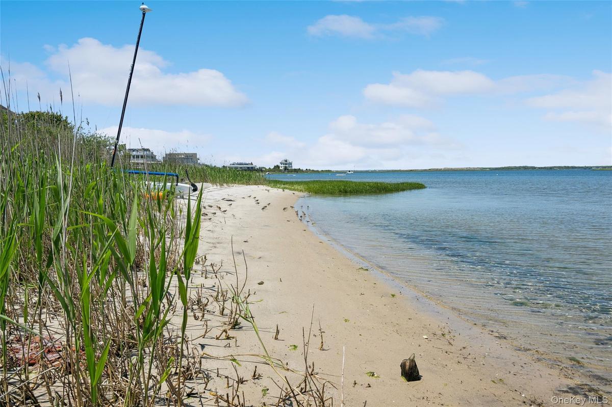 View of water feature with a beach view