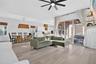 Living room, Kitchen and outdoor patio view