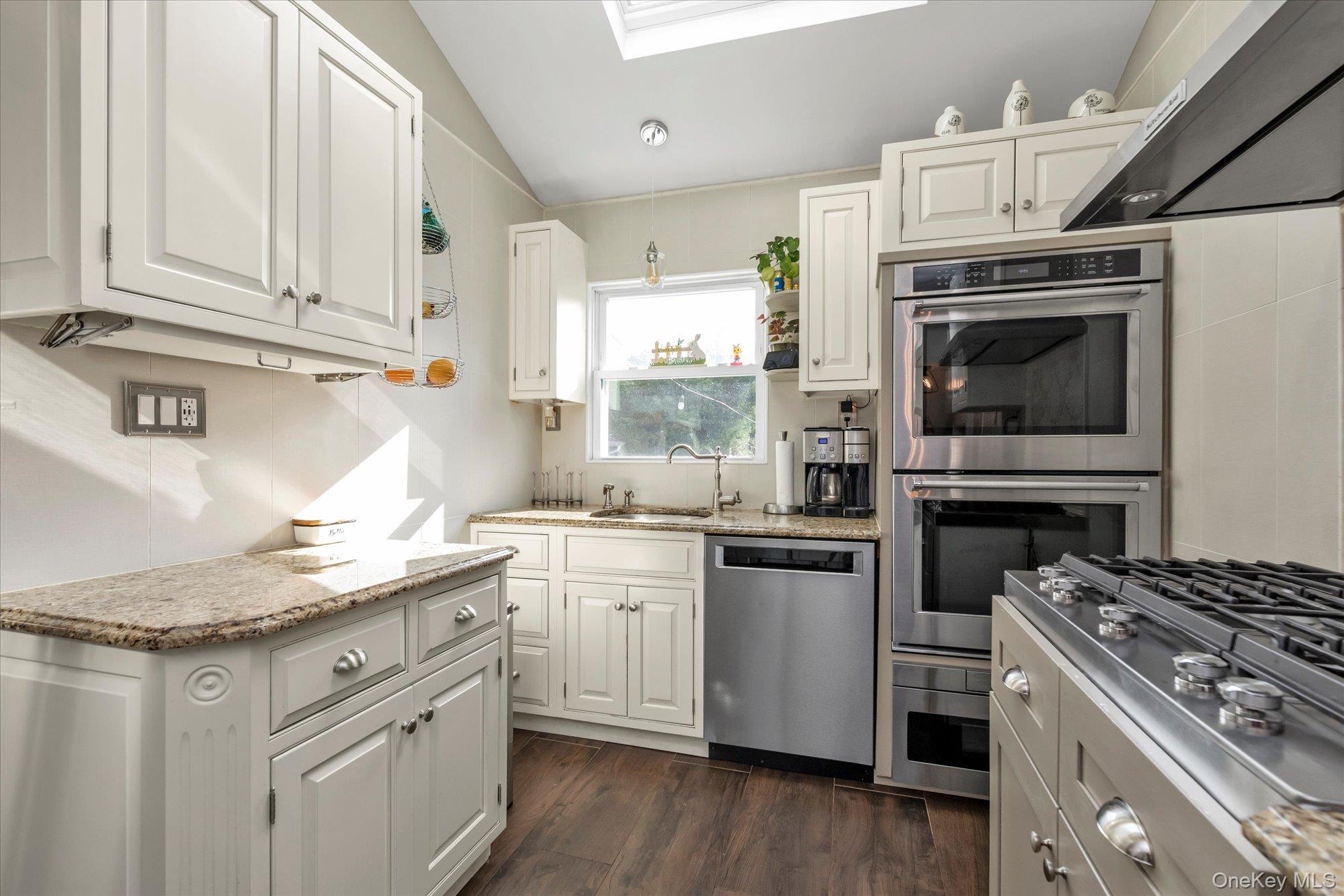 Fully Renovated Kitchen With SS Appliances, Skylight, Radiant Flooring