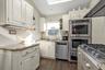 Fully Renovated Kitchen With SS Appliances, Skylight, Radiant Flooring