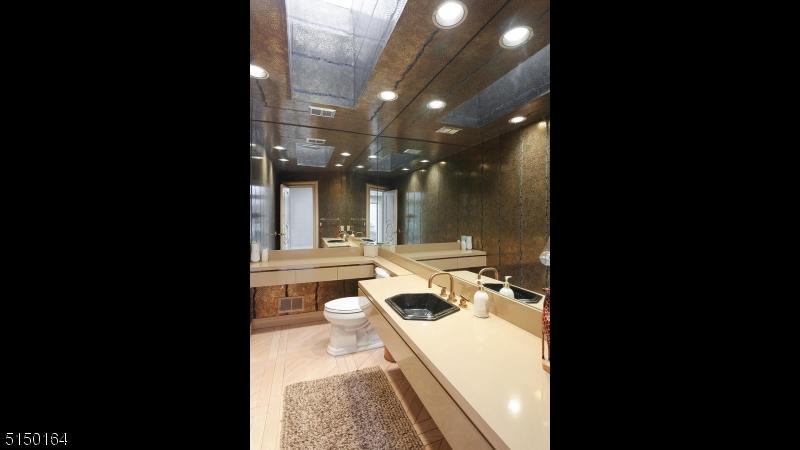 Powder room with a skylight