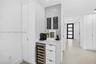 Bar area w/ wine cooler / coffee station w/ extra storage
