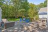 Wooden terrace with outdoor lounge area and outdoor dining space