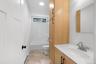 Full bathroom just across from the 2 bedrooms, very high ceilings and lots of natural light.