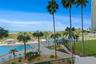 View from patio of 303. Notice the beautifully maintained grounds and amenities