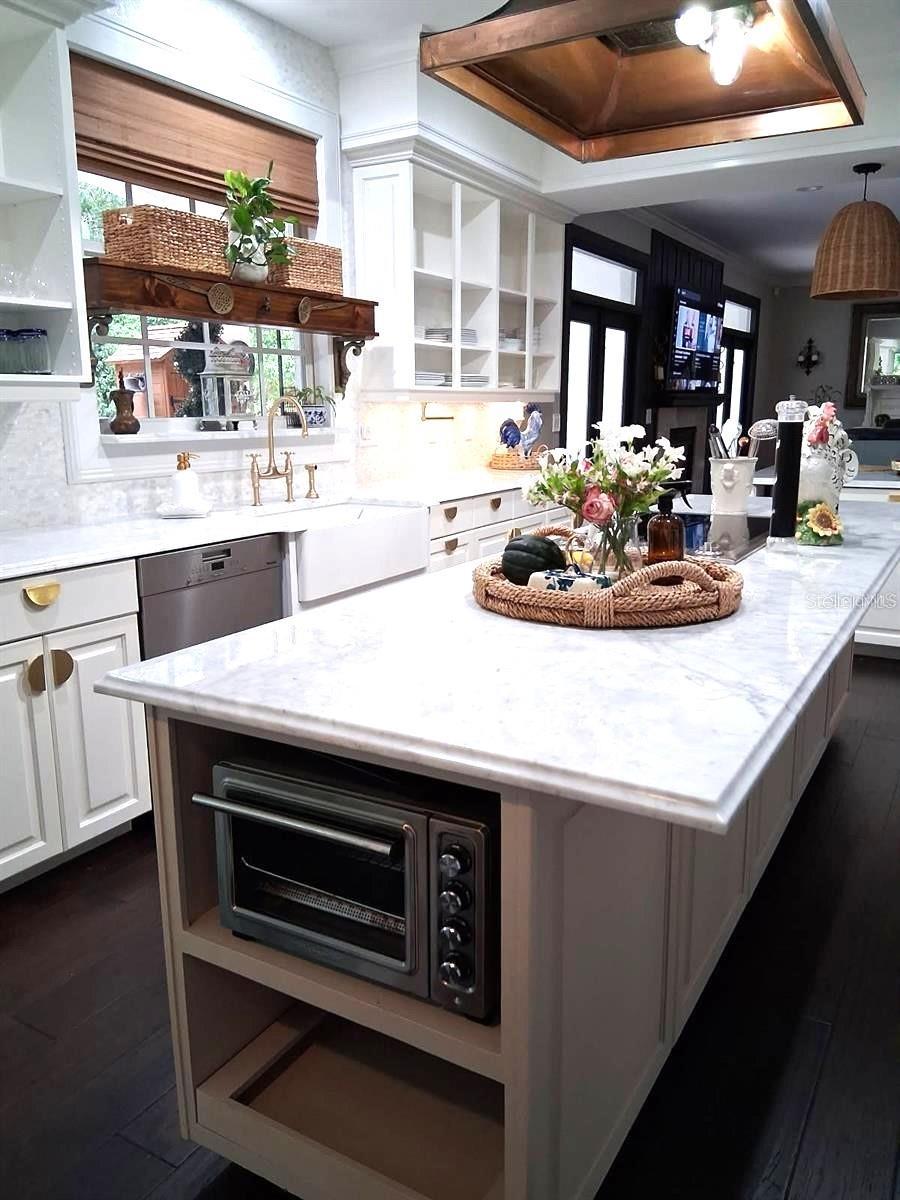 Stunning Copper Hood. Miele Dishwasher. Perrin & Rowe Faucet & more