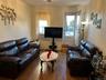 Living room featuring hardwood / wood-style flooring