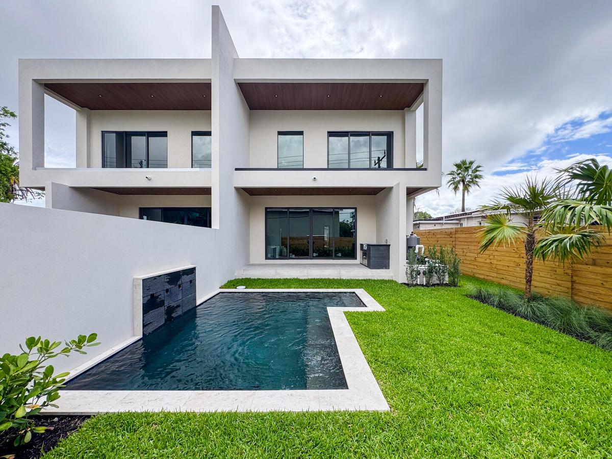 (as of April 8, 2026) west-facing backyard with privacy wall, 11x14 spa pool, and well landscaped