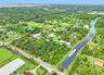 10-acre corner lot with direct bridle path access.