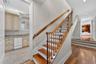 Back stairs leading to primary bedroom