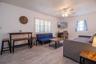 Shared living room with 2 sofa beds, dining table, tv, Laptop-friendly workspace
